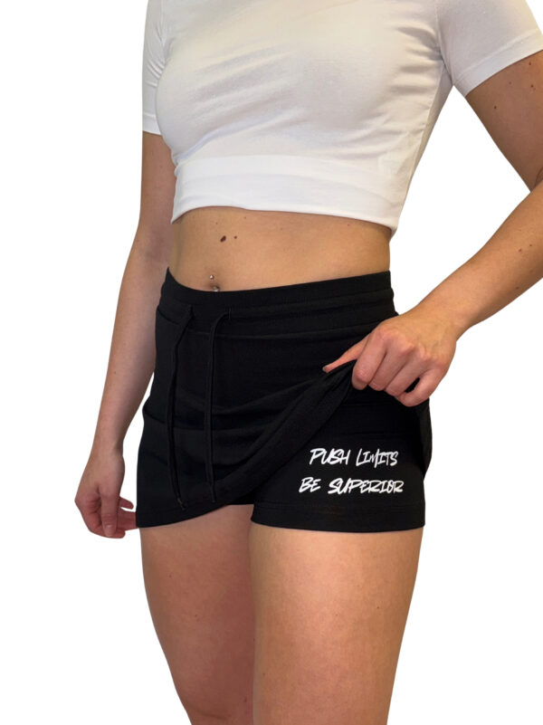 Two in One Women’s Sports Skirt PUSH LIMITS BE SUPERIOR – black skirt with built-in shorts and bold print